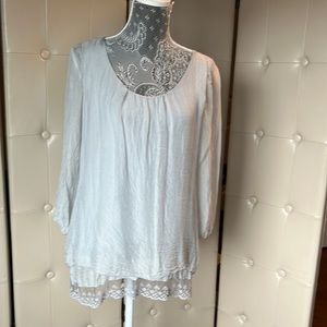 Light gray blouse with lace hem